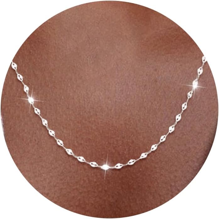 Fine flat mirror-link chain necklace worn at the collarbone