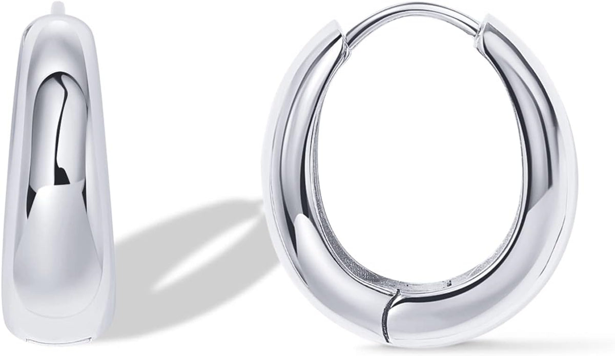 Chunky small hoop earrings with a thick rounded profile