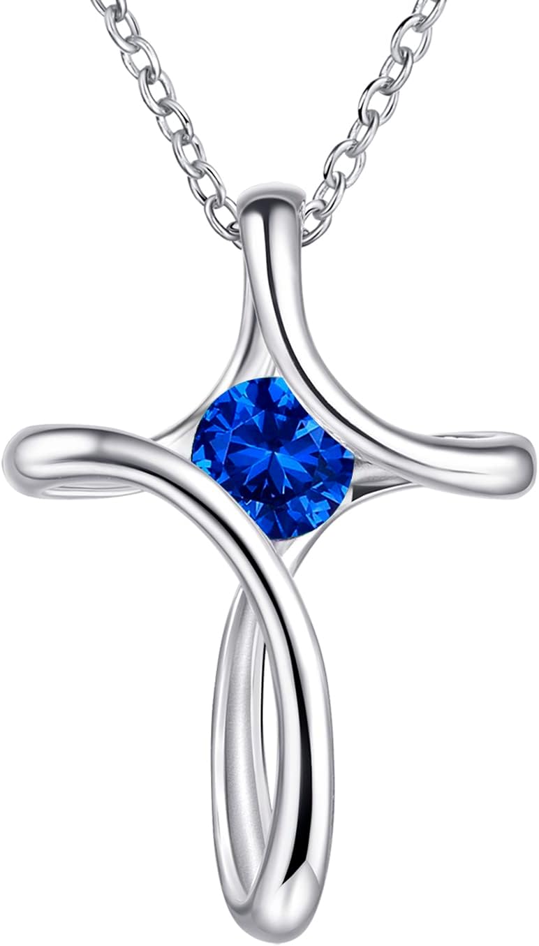 Silver-tone looped cross pendant with a round birthstone-color crystal