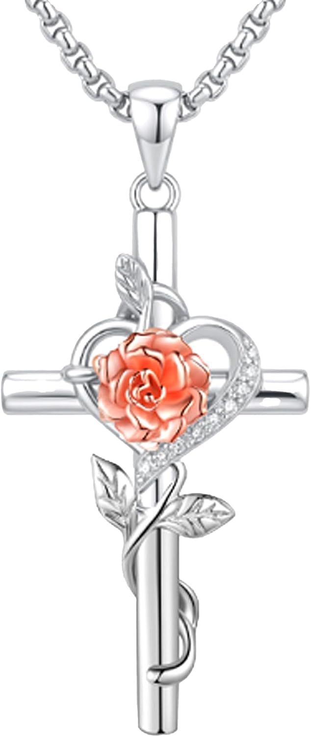 Silver-tone cross pendant with a leaf vine and an enamel birth flower