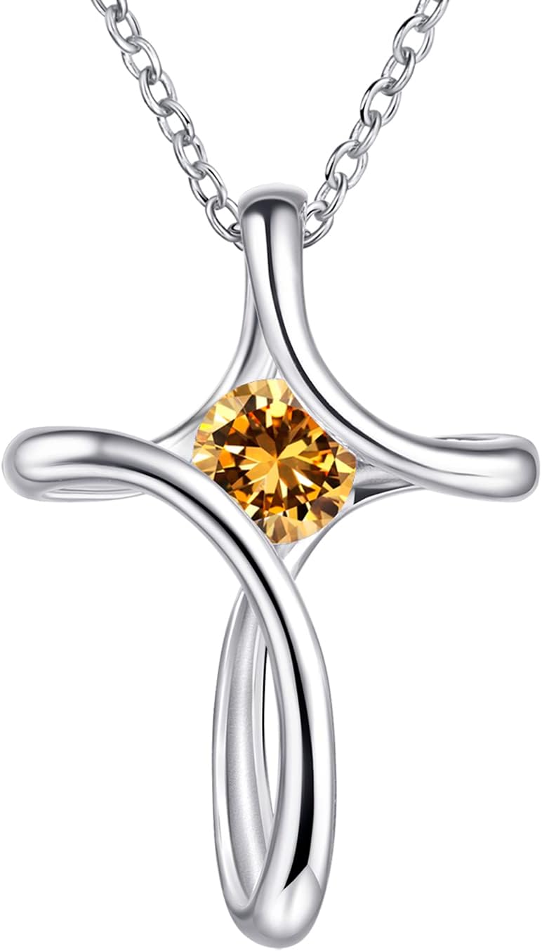 Silver-tone looped cross pendant with a round birthstone-color crystal