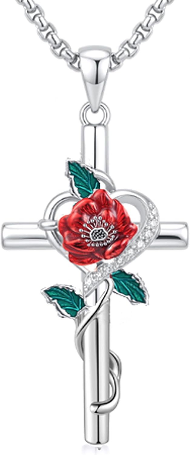 Silver-tone cross pendant with a leaf vine and an enamel birth flower