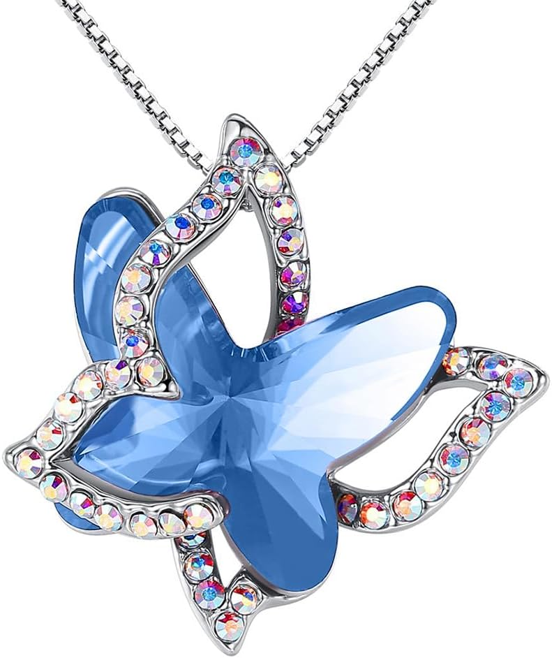 Faceted crystal butterfly pendant with a pave silver-tone wing overlay