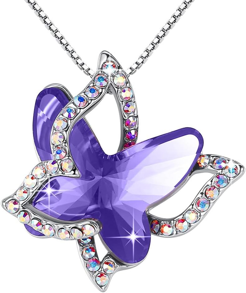 Faceted crystal butterfly pendant with a pave silver-tone wing overlay