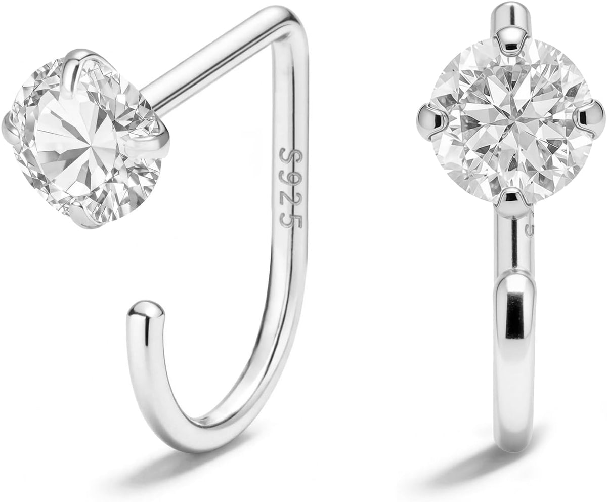 Small half hoop huggie earrings shown in several designs