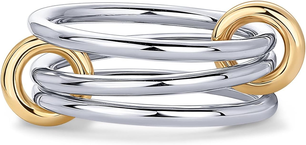 Multi band ring with four linked bands, two set with stones