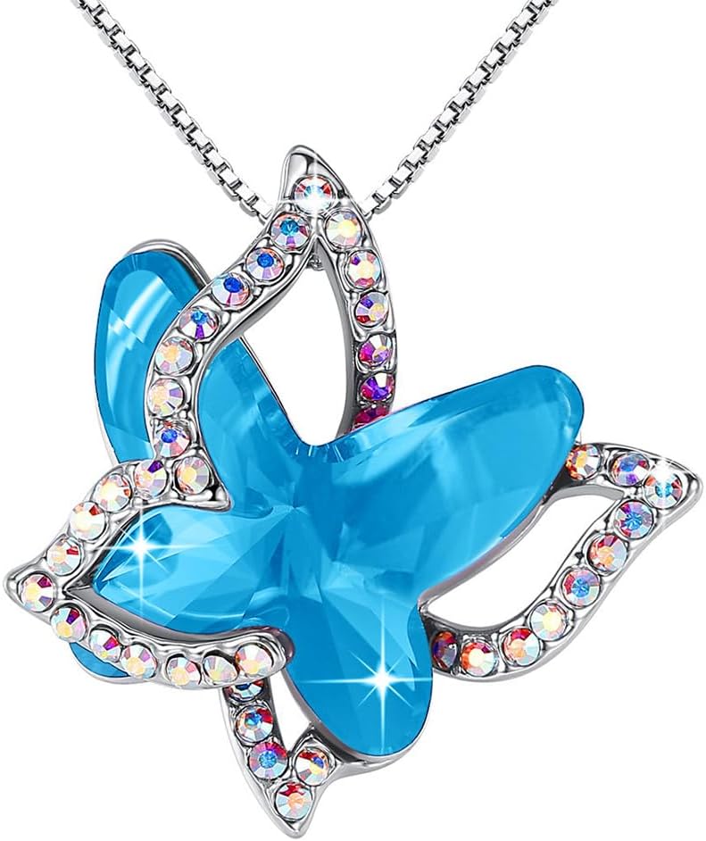 Faceted crystal butterfly pendant with a pave silver-tone wing overlay