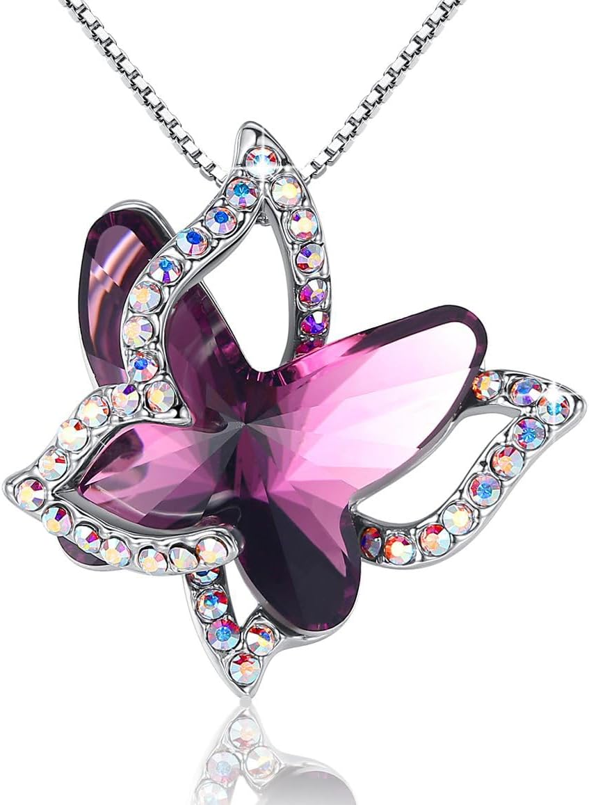 Faceted crystal butterfly pendant with a pave silver-tone wing overlay