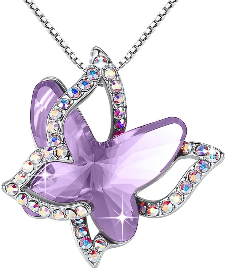 Faceted crystal butterfly pendant with a pave silver-tone wing overlay