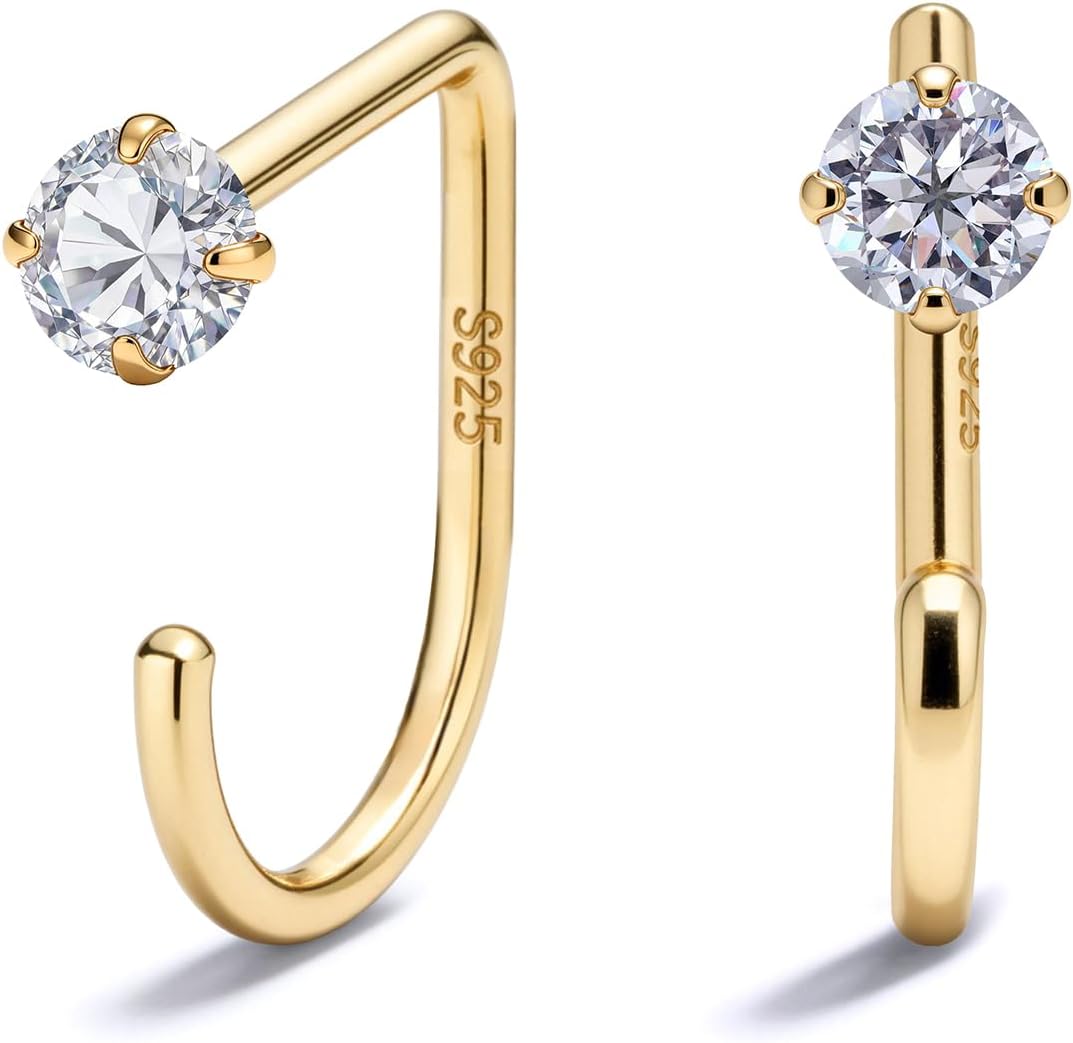 Small half hoop huggie earrings shown in several designs