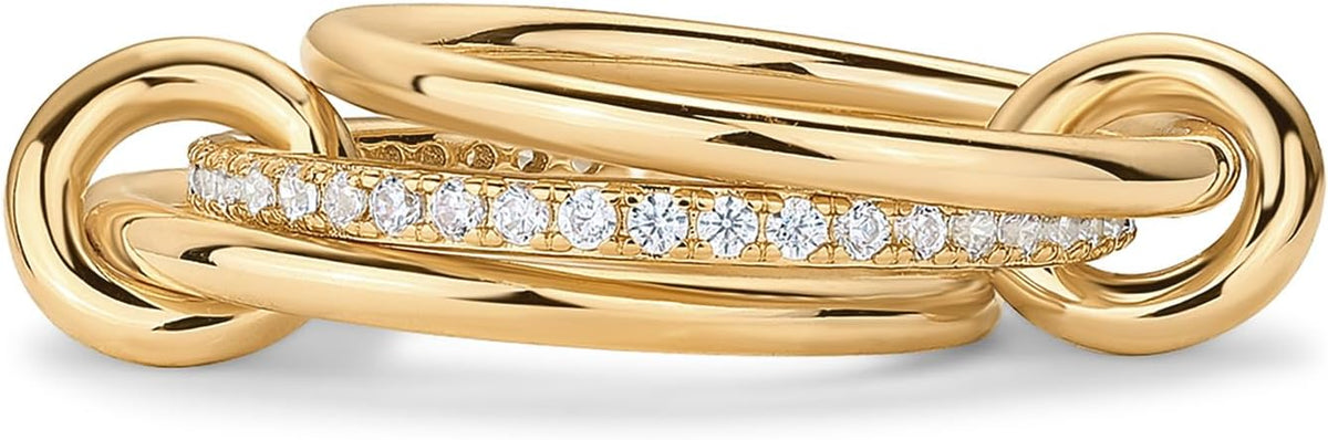 Multi band ring with four linked bands, two set with stones