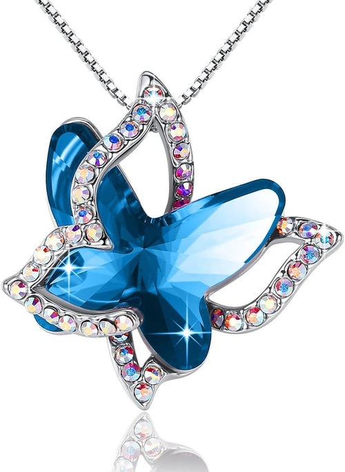 Faceted crystal butterfly pendant with a pave silver-tone wing overlay