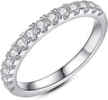 Half eternity band with round stones prong set across the front