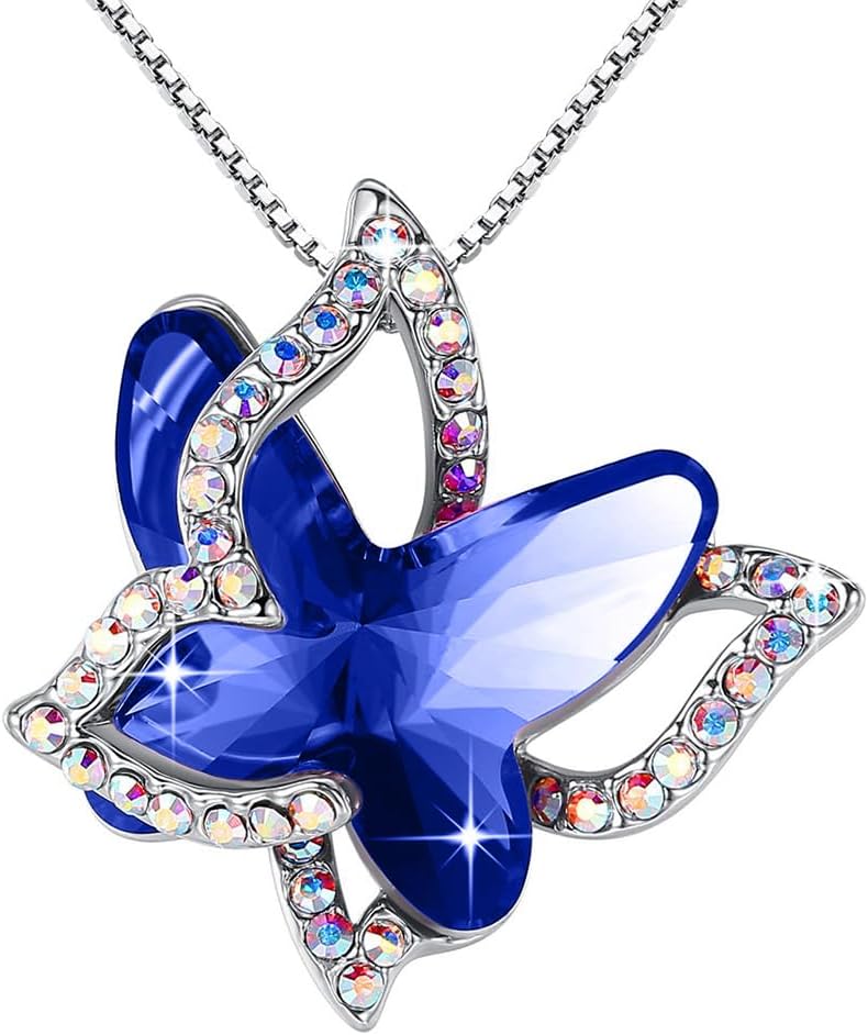 Faceted crystal butterfly pendant with a pave silver-tone wing overlay