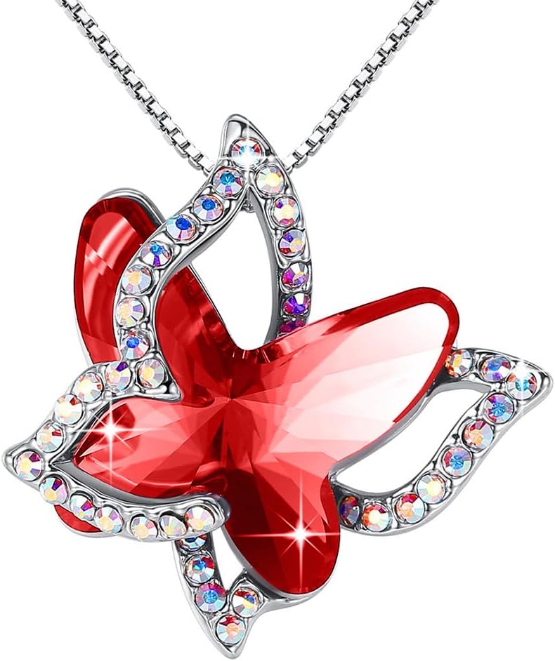 Faceted crystal butterfly pendant with a pave silver-tone wing overlay