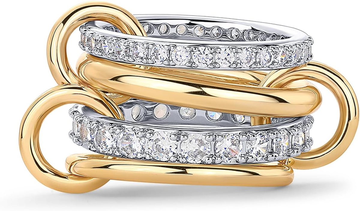 Multi band ring with four linked bands, two set with stones