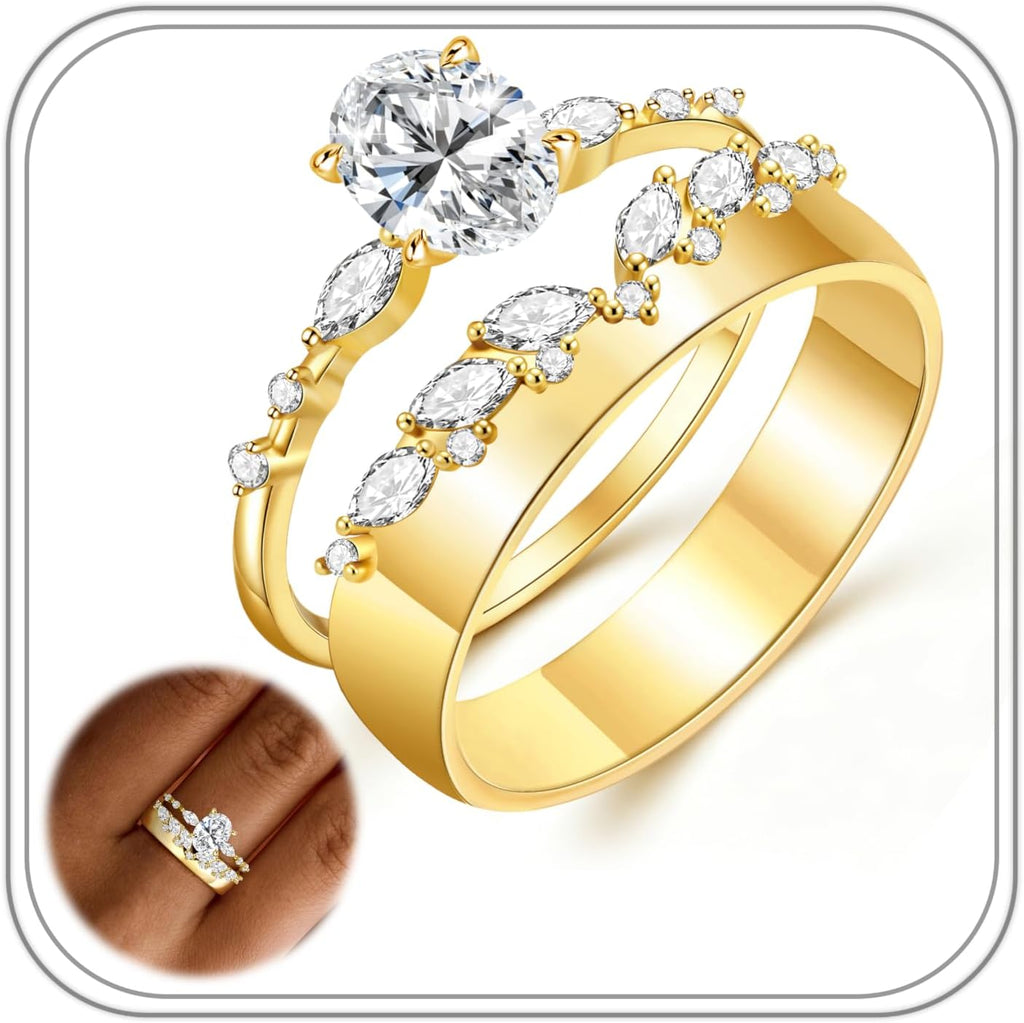 Two slim gold-tone stacking bands, one set with an oval stone