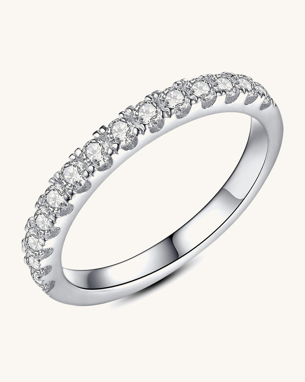 Half eternity band with round stones prong set across the front