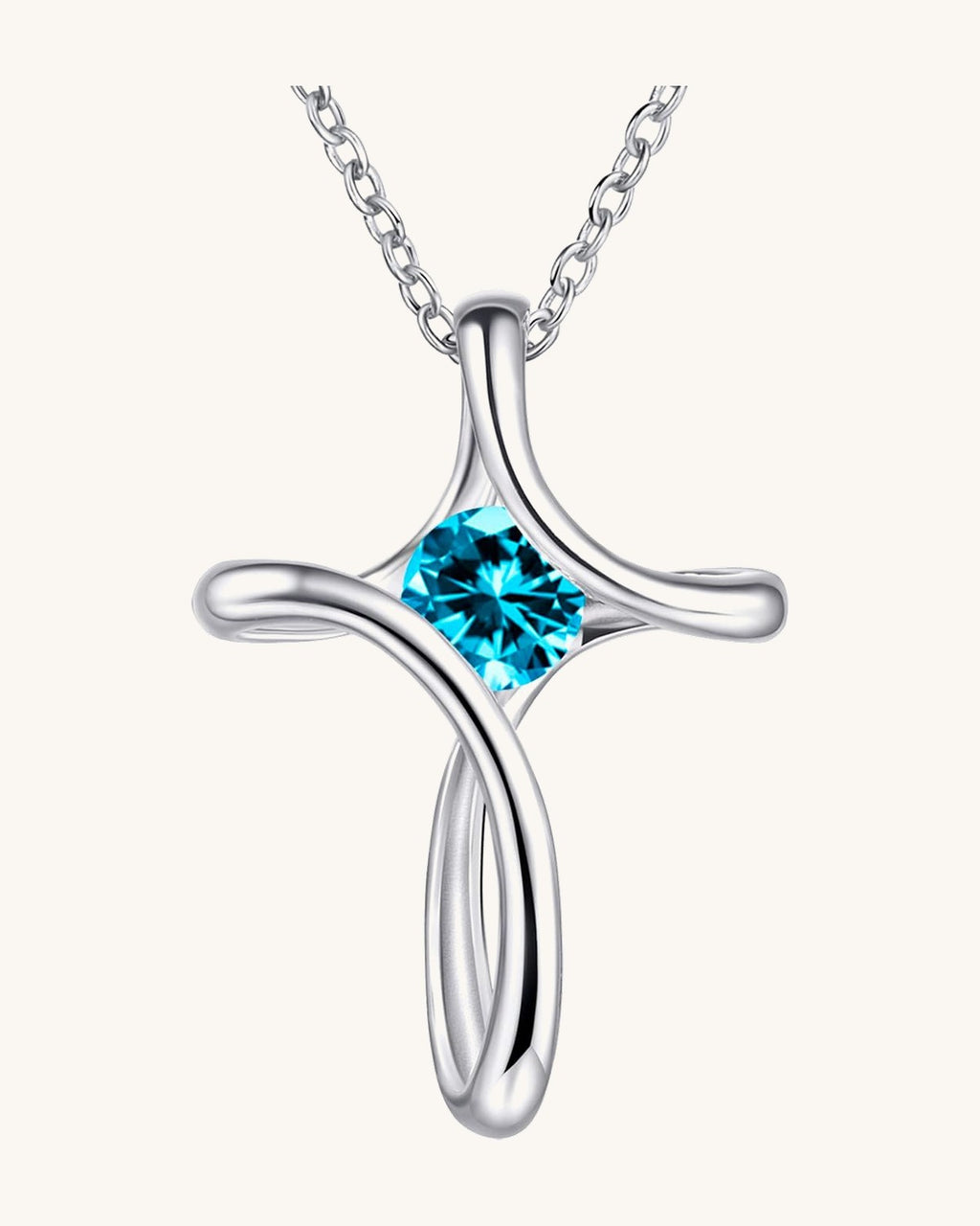 Silver-tone looped cross pendant with a round birthstone-color crystal