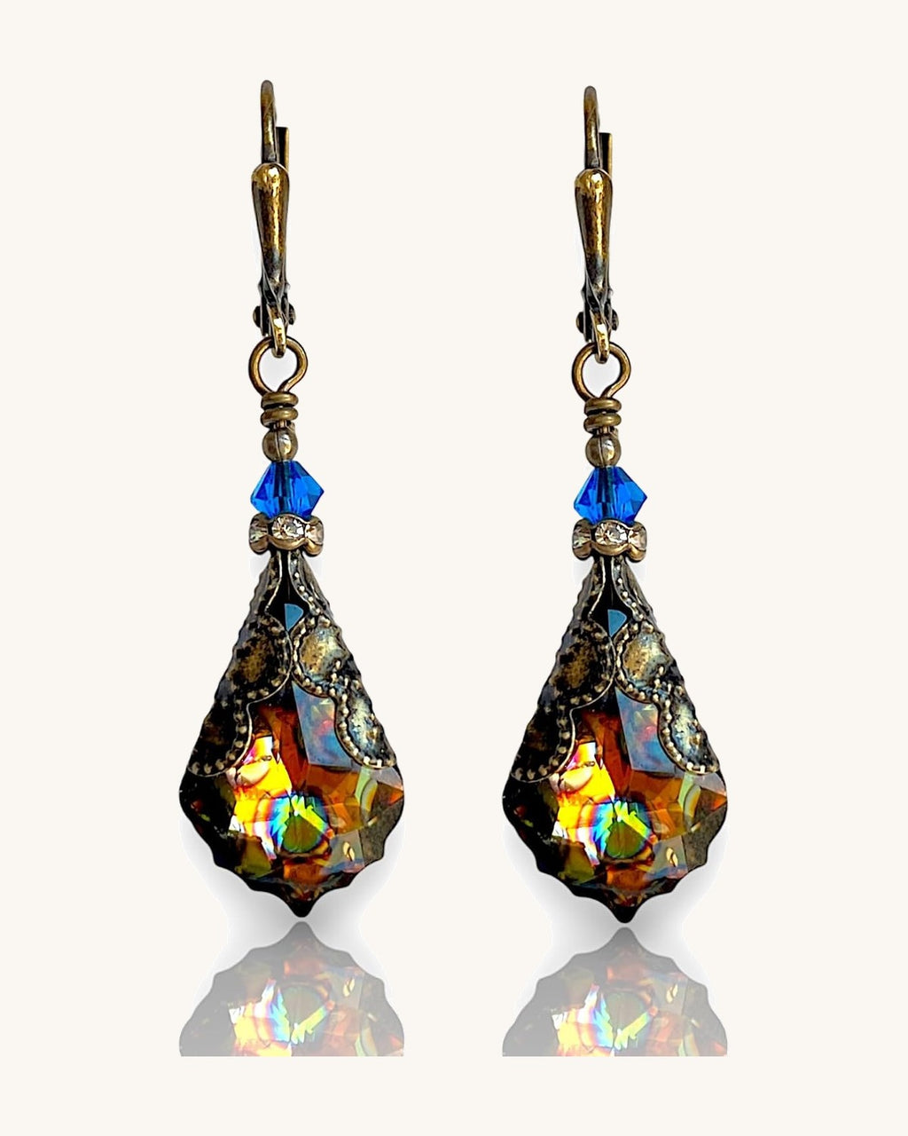 Antique brass-tone leverback earrings with a faceted glass drop