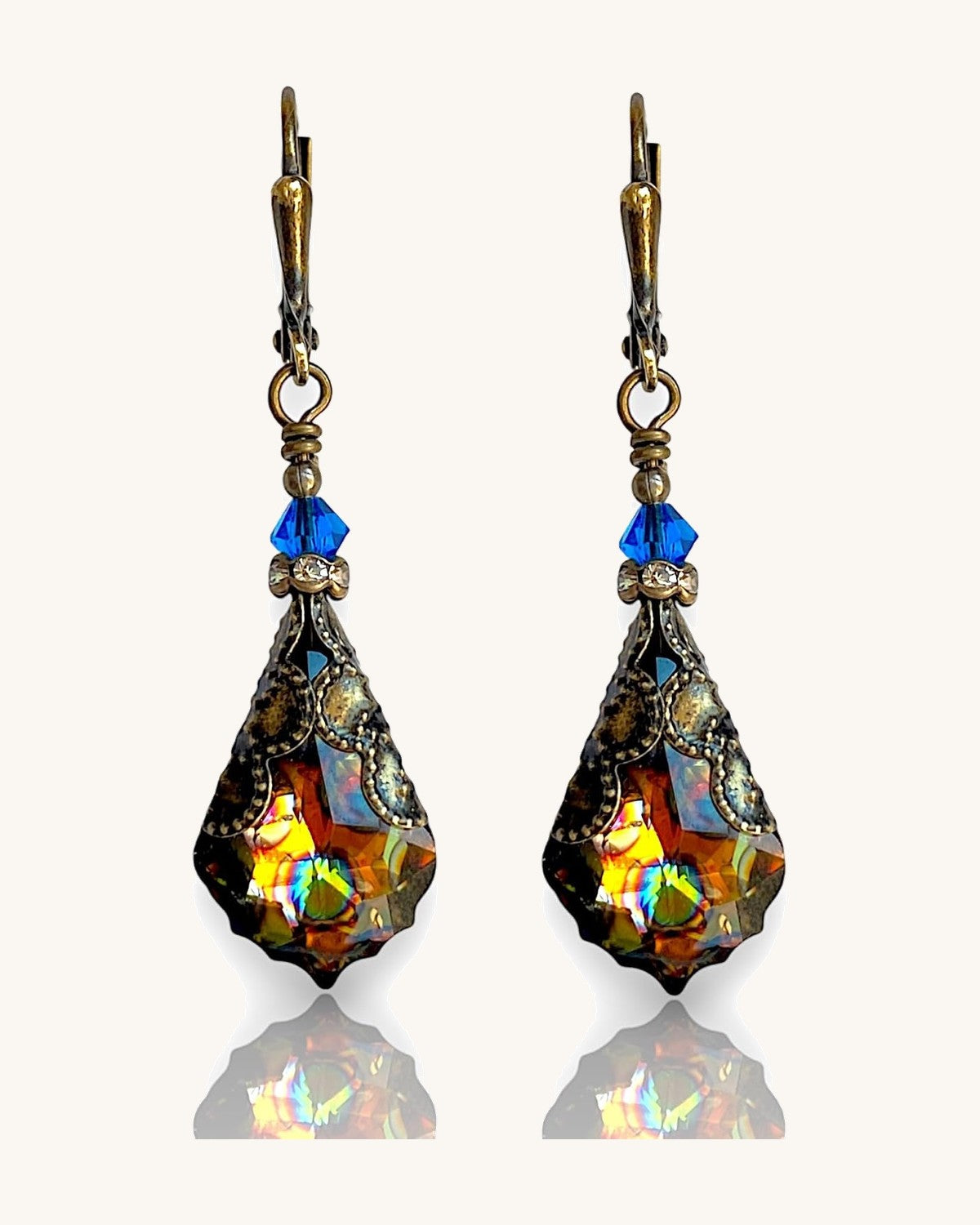 Antique brass-tone leverback earrings with a faceted glass drop